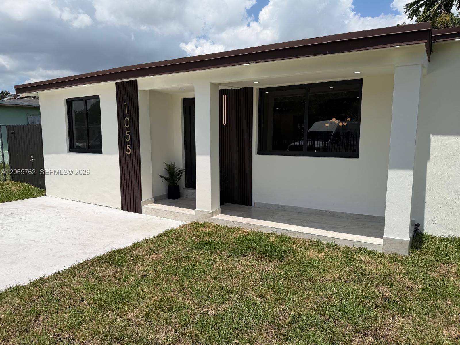 1055 NW 143rd St, Miami, FL 33168 photo 2