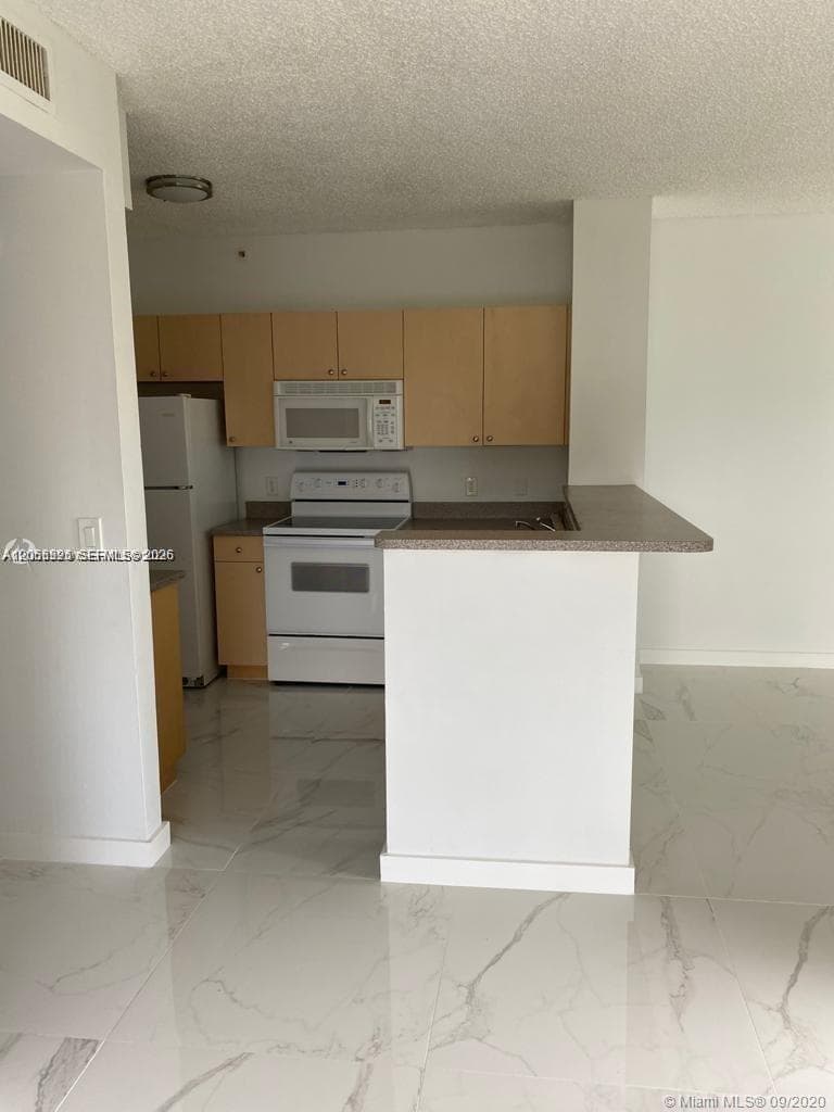 7980 N Nob Hill Rd # 102, Tamarac, FL 33321 photo 2