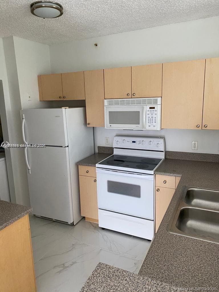 7980 N Nob Hill Rd # 102, Tamarac, FL 33321 photo 3