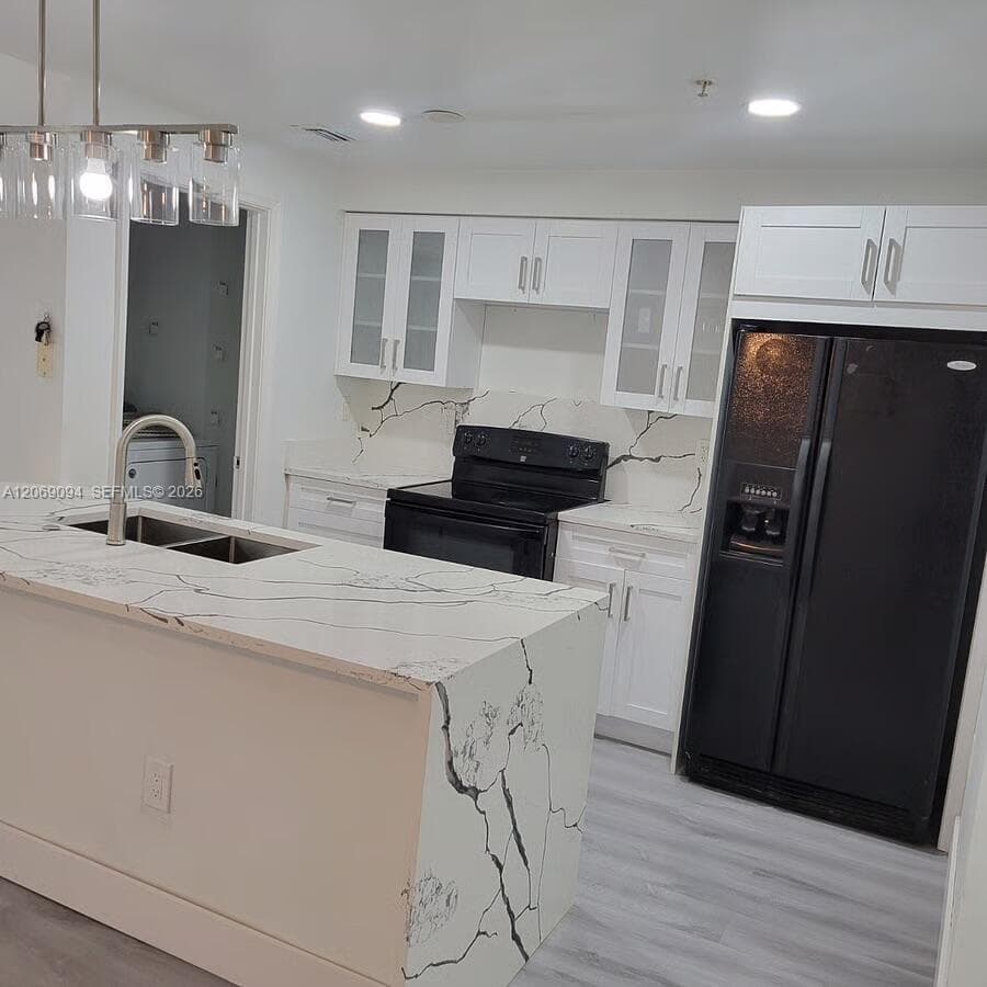5840 W Sample Rd # 302, Coral Springs, FL 33067 photo 2