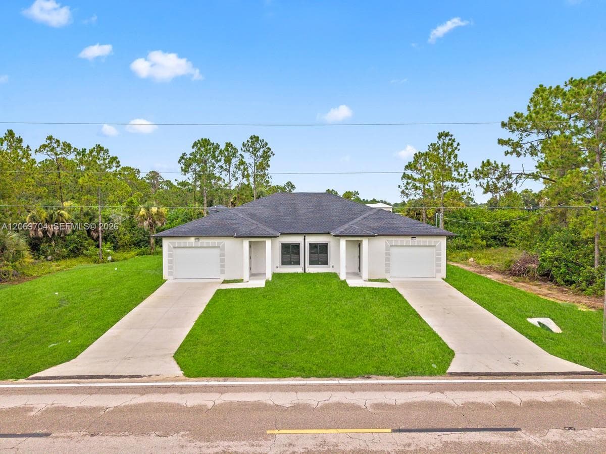 316 12TH ST, Lehigh Acres, FL 33972 photo 2