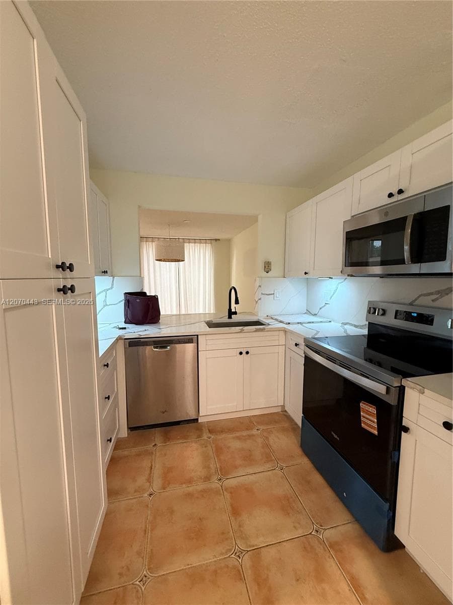 3522 Torremolinos Ave # E-31, Doral, FL 33178 photo 3
