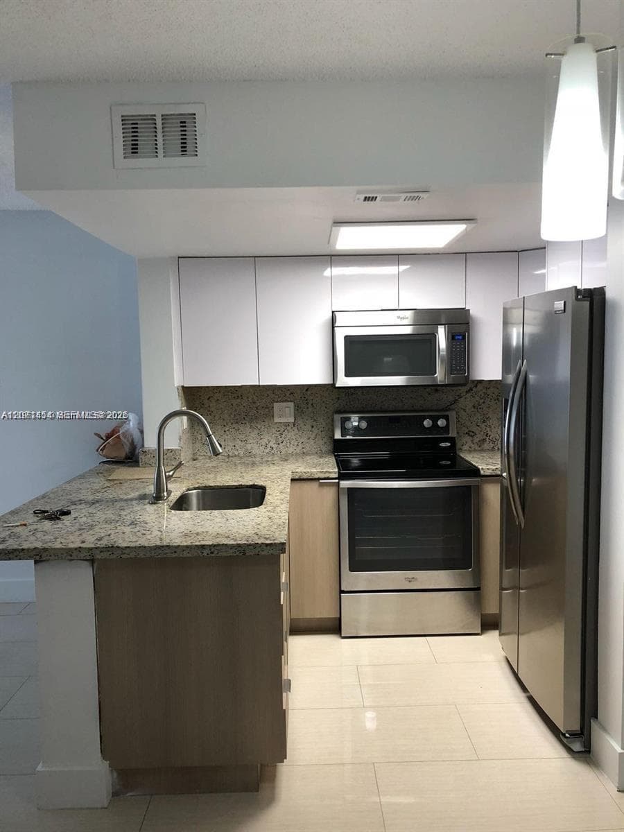 8670 NW 6th Ln # 4-208, Miami, FL 33126 photo 4