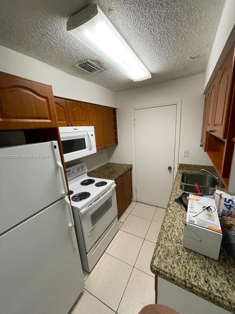 17515 NW 67th Ct # E-22, Hialeah, FL 33015 photo 3