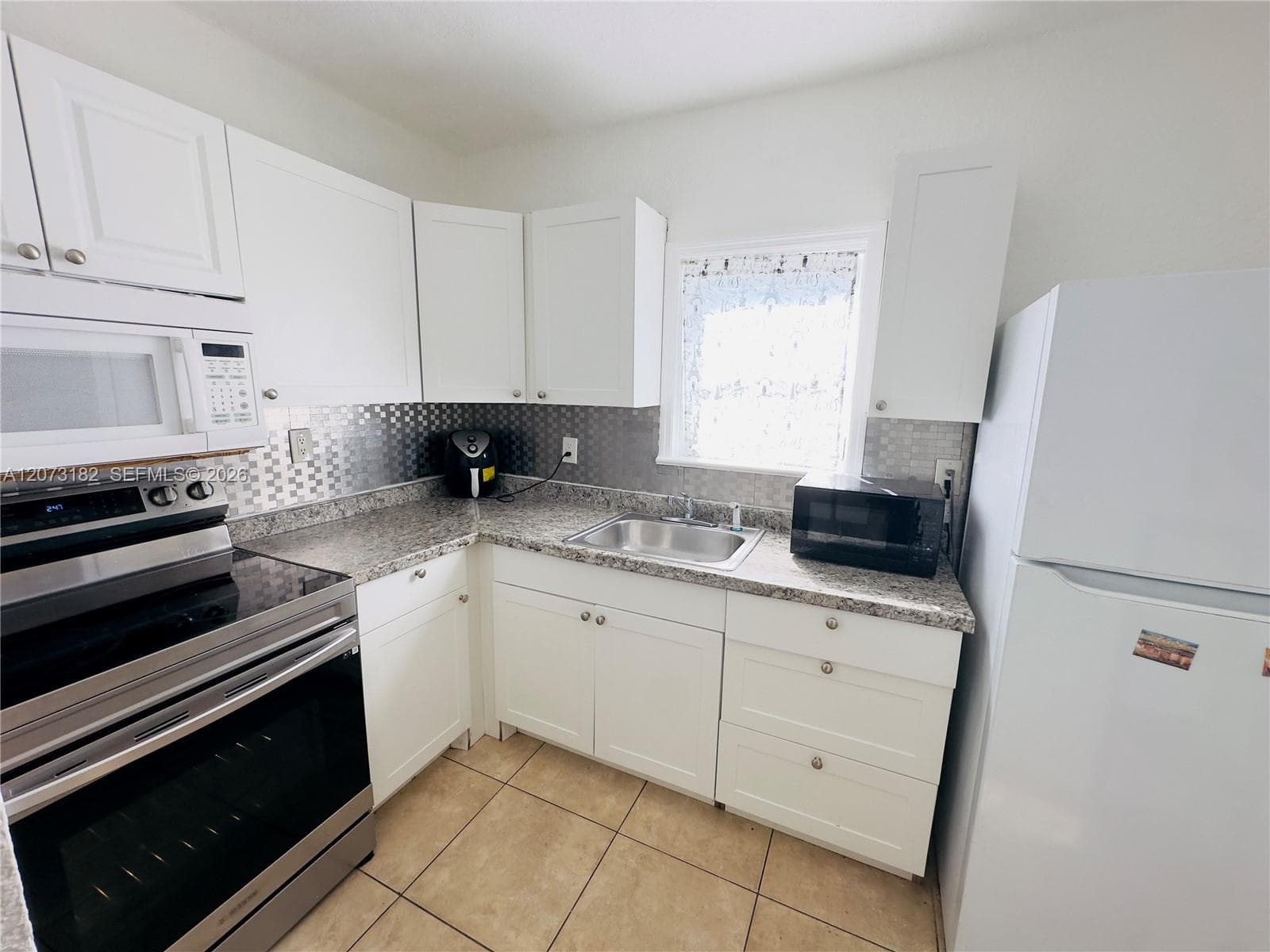 301 NW 37th St, Miami, FL 33127 photo 3