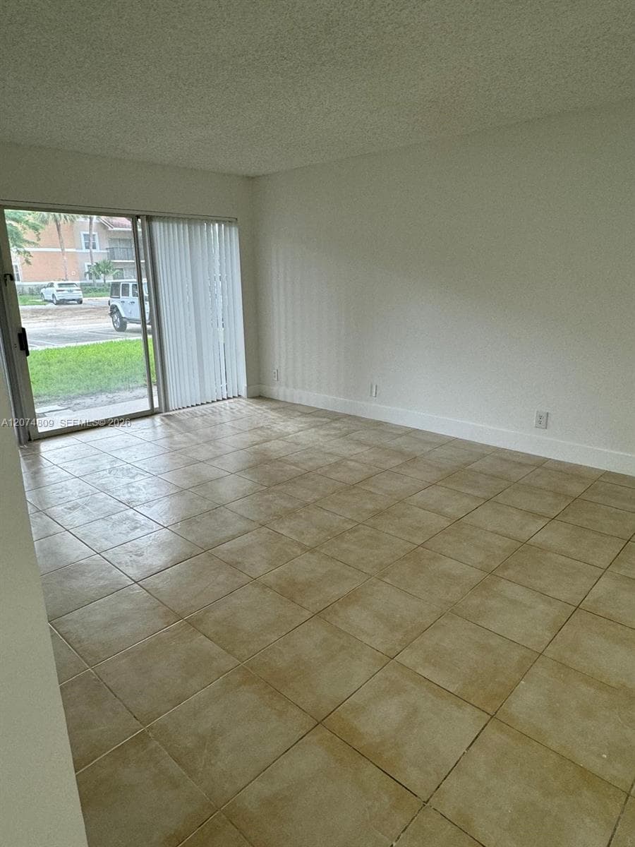 8801 Wiles Rd # 103, Coral Springs, FL 33067 photo 2