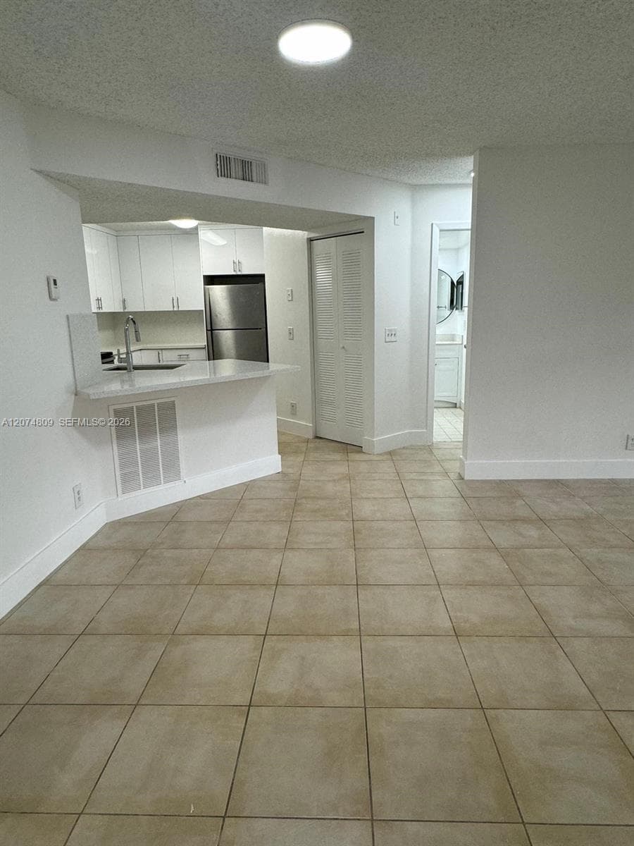 8801 Wiles Rd # 103, Coral Springs, FL 33067 photo 3