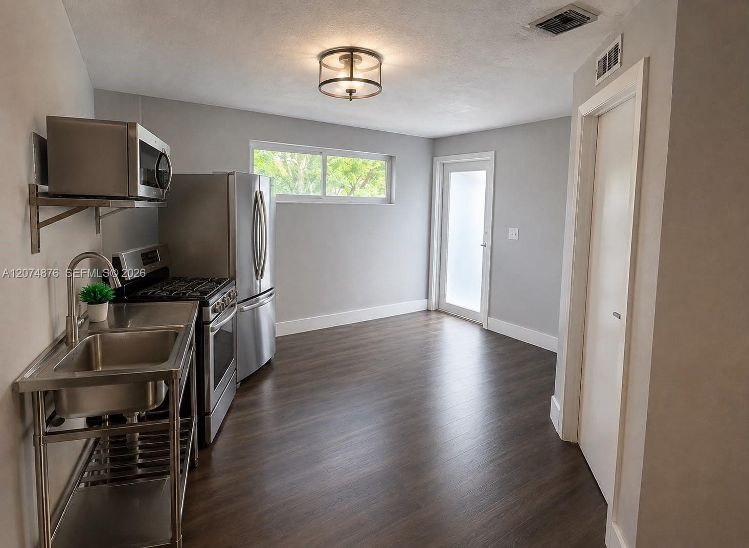586 NW 48th St # 1, Miami, FL 33127 photo 3