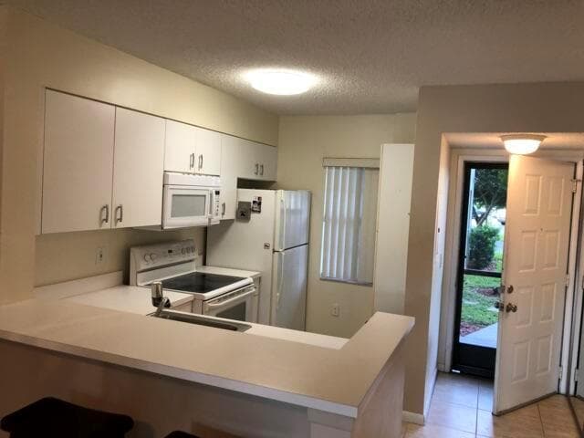 2236 N CYPRESS BEND Drive # 106, Pompano Beach, FL 33069 photo 3