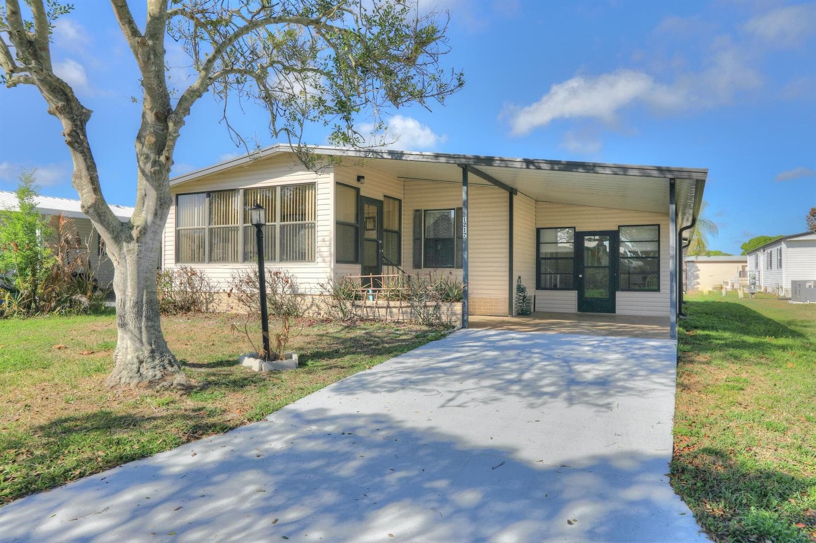 1212 Paurotis Drive, Barefoot Bay, FL 32976 photo 2