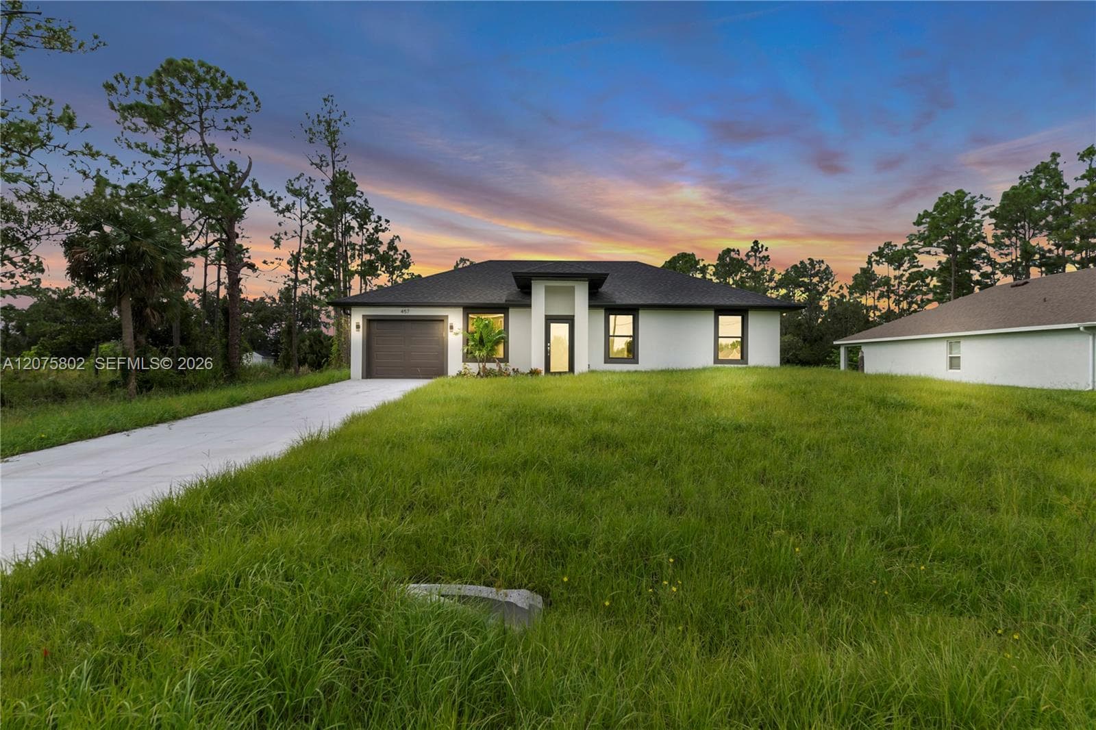 457 Woodman DR, Lehigh Acres, FL 33972