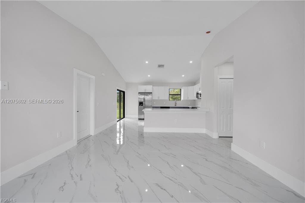 457 Woodman DR, Lehigh Acres, FL 33972 photo 4