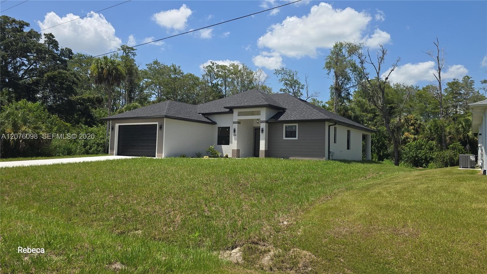 580 WOODVIEW DR, Lehigh Acres, FL 33972 photo 2