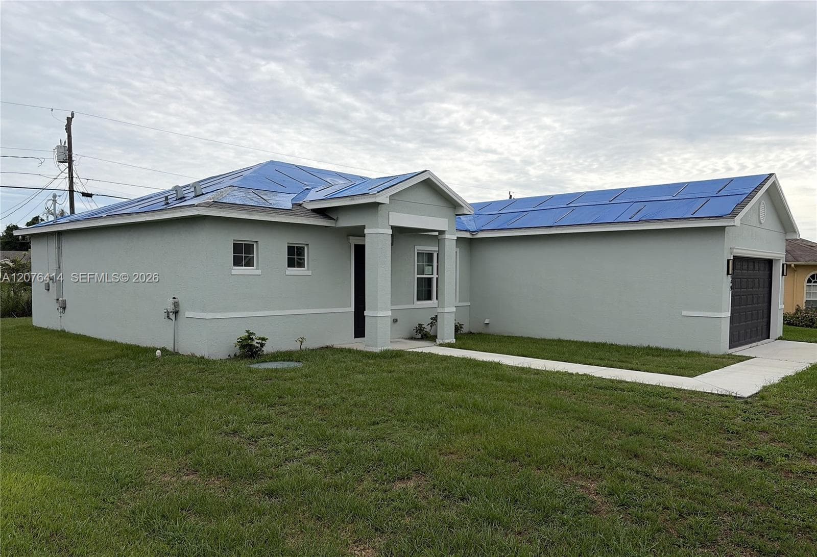 1649 SW Merchant Ln, Port St. Lucie, FL 34953 photo 2