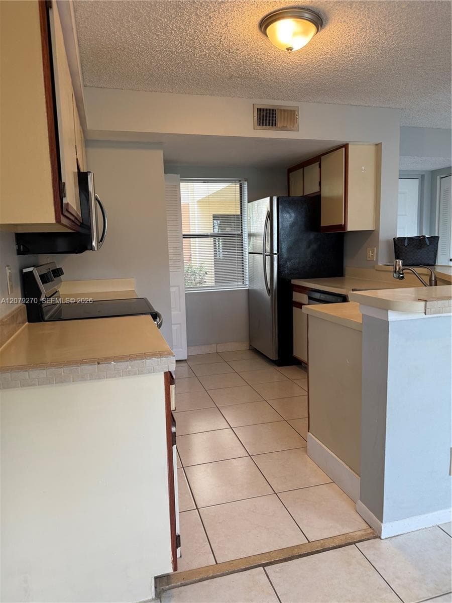 9999 Summerbreeze Dr # 119, Sunrise, FL 33322 photo 3