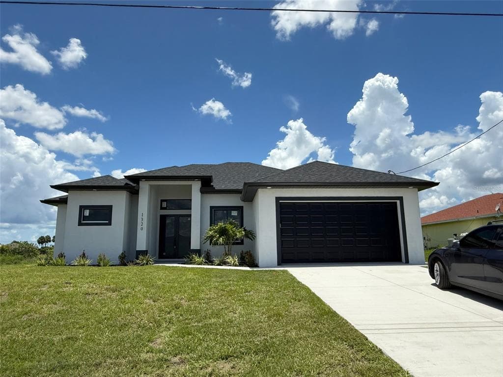 1320 NE 14TH AVENUE, CAPE CORAL, FL 33909