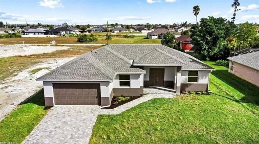928 NE 3RD AVENUE, CAPE CORAL, FL 33909
