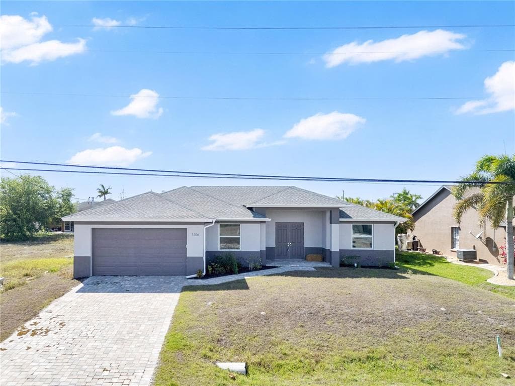 1306 NE 2ND AVENUE, CAPE CORAL, FL 33909