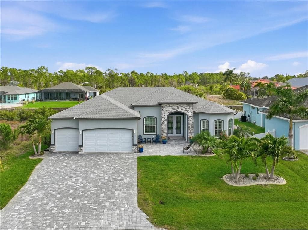 9214 MELODY CIRCLE, PORT CHARLOTTE, FL 33981