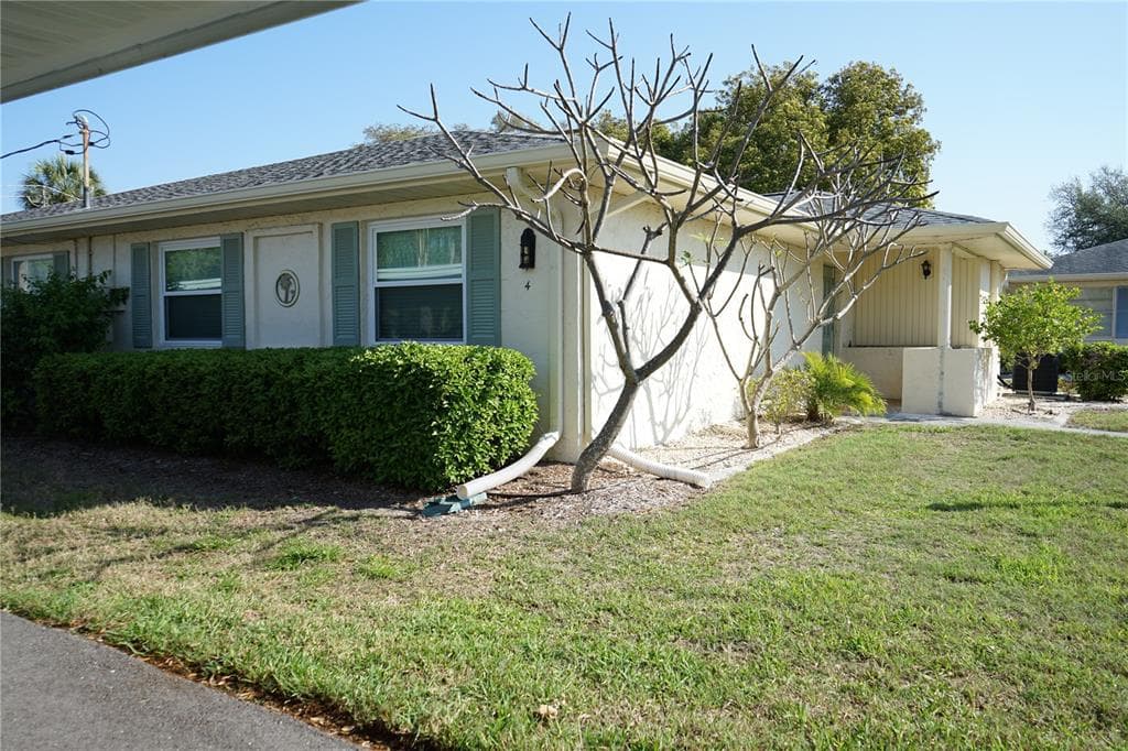 1901 CANTERBURY LANE # 4, SUN CITY CENTER, FL 33573