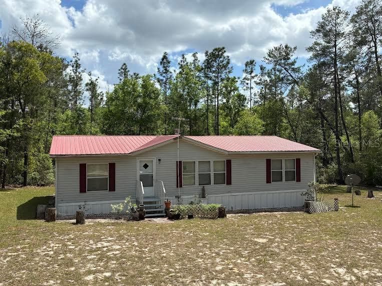 109 GREENWOOD ROAD, FLORAHOME, FL 32140
