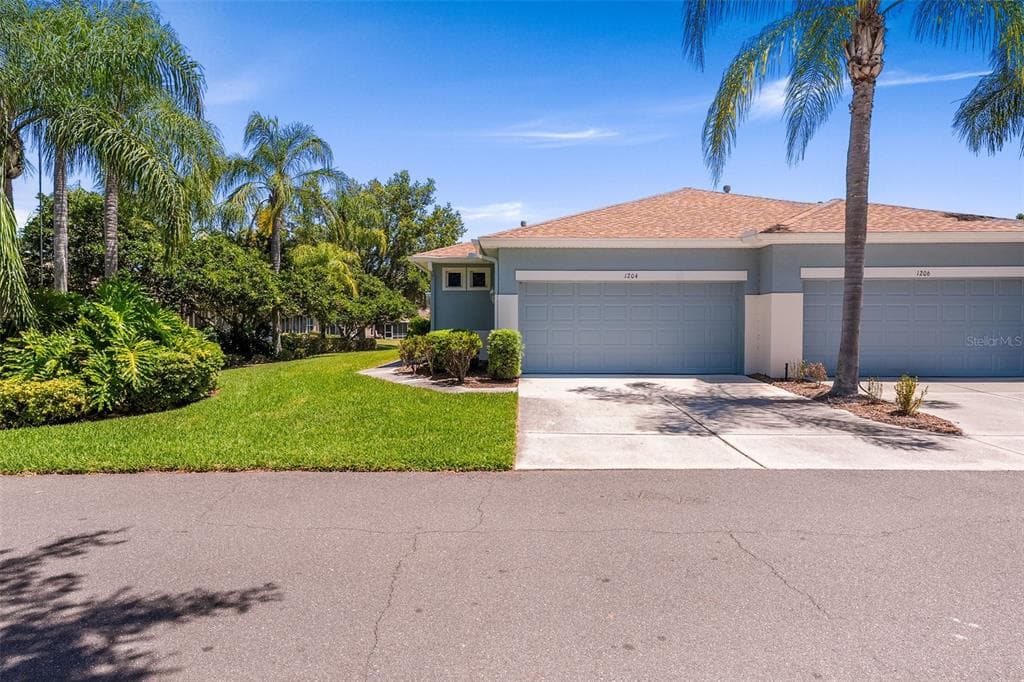 1204 HUNTINGTON GREENS DRIVE # 1204, SUN CITY CENTER, FL 33573
