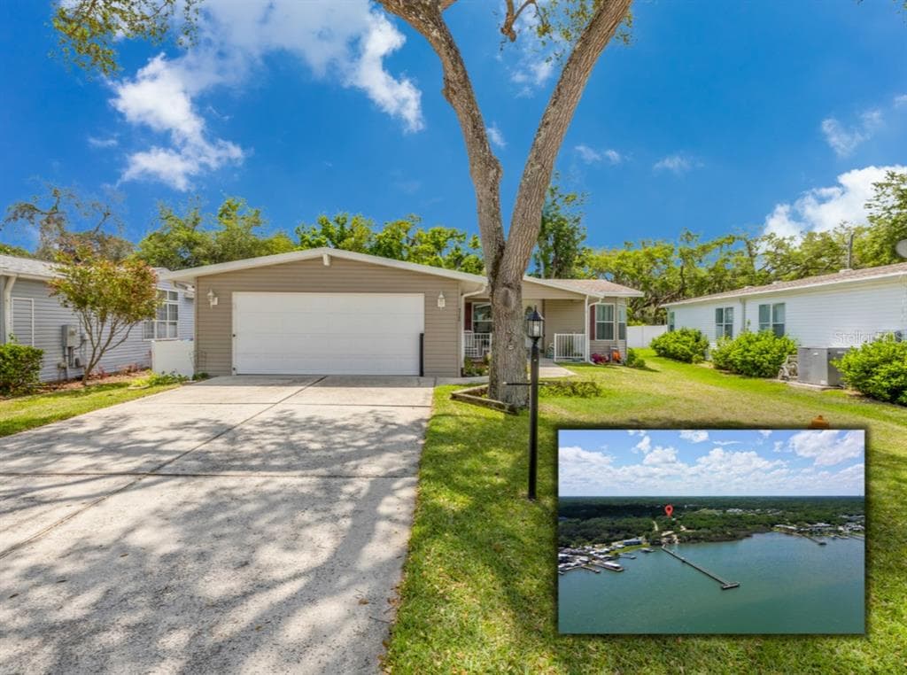 317 WATER LANDING DRIVE, OAK HILL, FL 32759