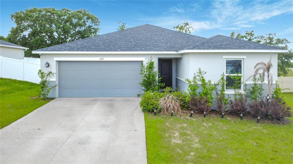1507 GERANIUM DRIVE, MASCOTTE, FL 34753