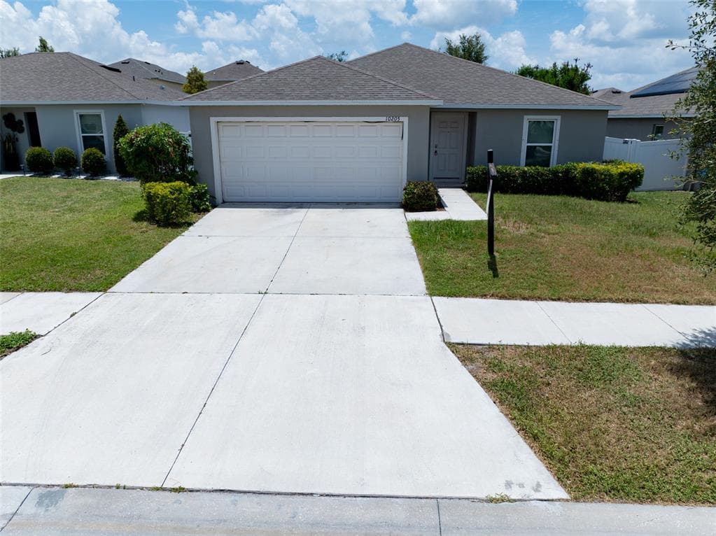 10205 CARP HOLLOW ROAD, SUN CITY CENTER, FL 33573
