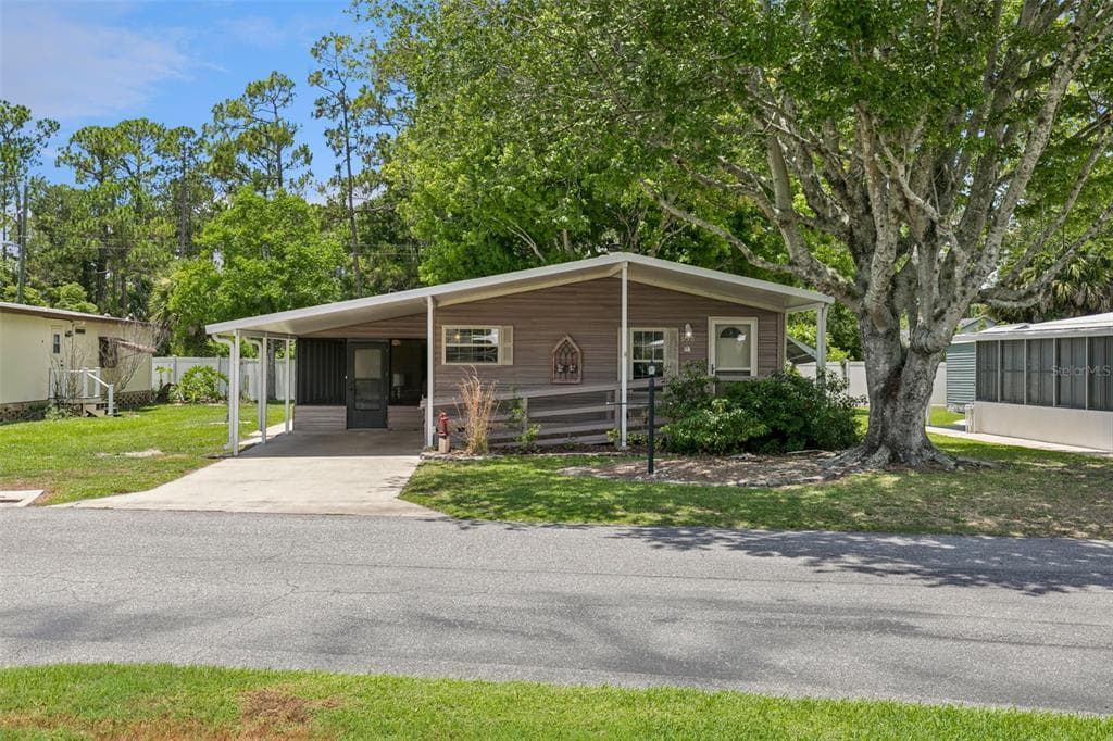 938 BLUE HERON BOULEVARD, OSTEEN, FL 32764