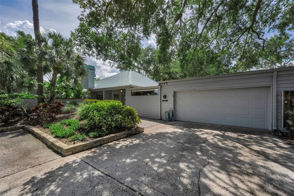 10497 LONGWOOD DRIVE, SEMINOLE, FL 33777