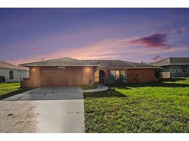 1219 NE 14TH PLACE, CAPE CORAL, FL 33909