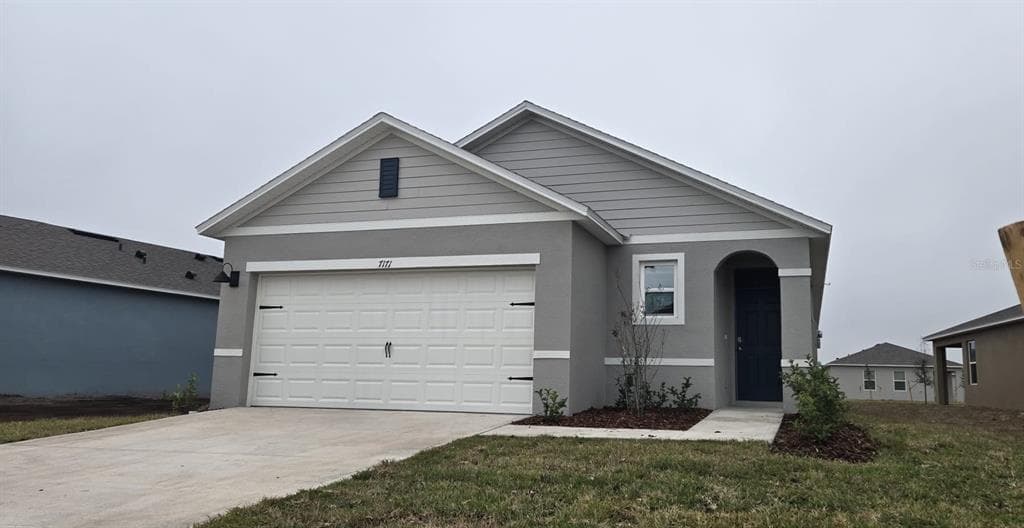 7171 CARIB GRACKLE DRIVE, HARMONY, FL 34773