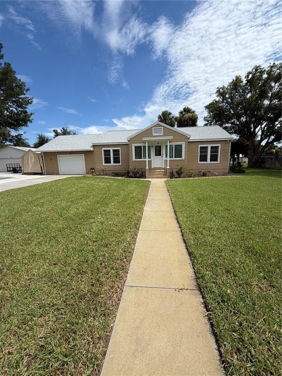 207 E HALIFAX AVENUE, OAK HILL, FL 32759