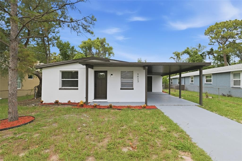 3412 E HENRY AVENUE, TAMPA, FL 33610