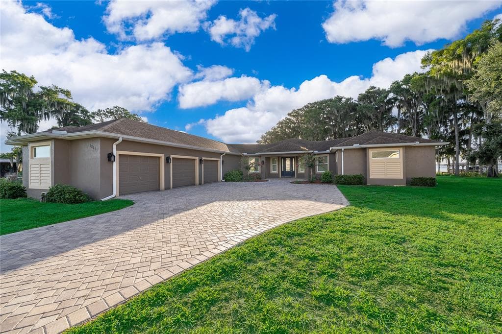 12131 EAGLES POINT COURT, GRAND ISLAND, FL 32735