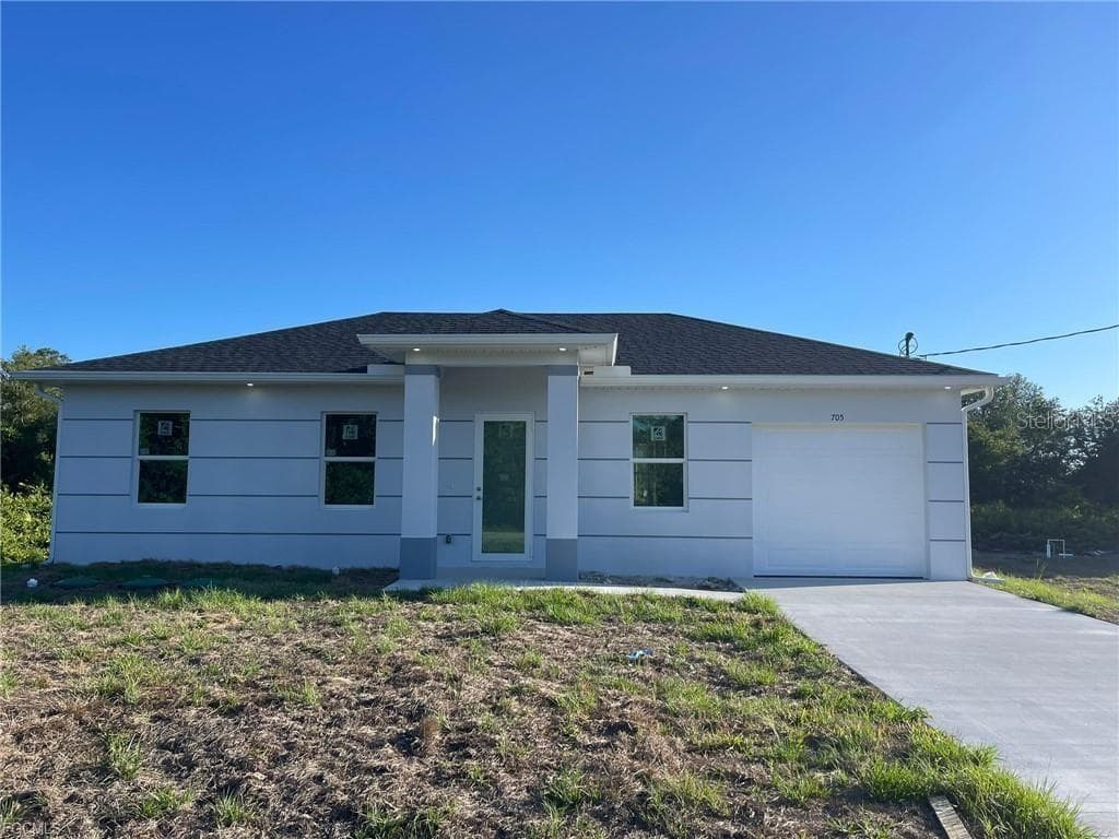 705 LEDGE STREET, LEHIGH ACRES, FL 33972