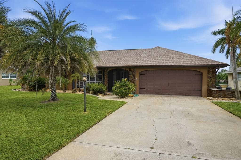 418 AVALON DRIVE, CAPE CORAL, FL 33904